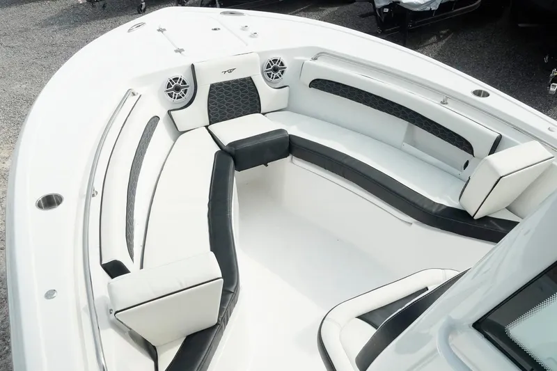 Slide: The Image of 2026 Tidewater 232 LXF boat interior with stylish seating and modern design. - 8