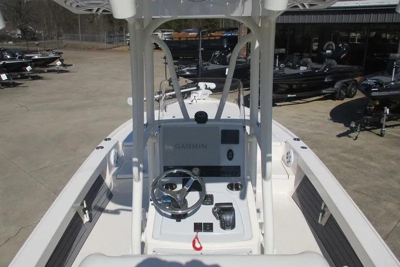 Slide: The Image of 2023 Custom Pathfinder 2500 boat dashboard with Garmin navigation system. - 14