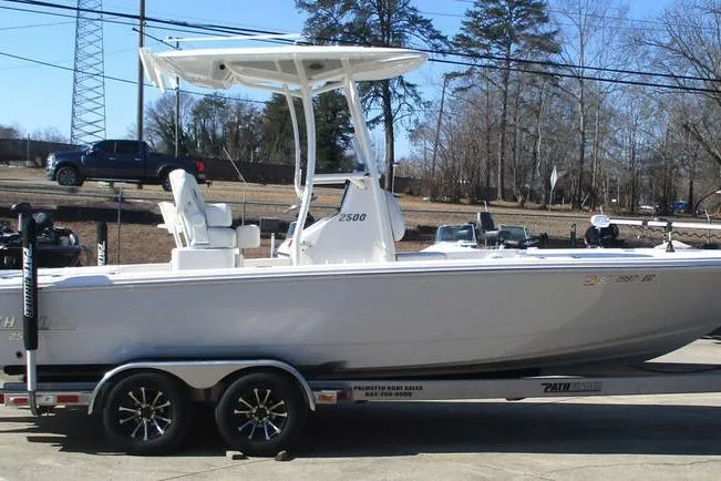 Slide: The Image of 2023 Custom Pathfinder 2500 boat on trailer, parked outdoors. - 5