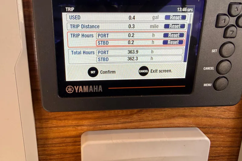 Slide: The Image of Yamaha display on 2022 Cutwater C-32 CB showing trip and total hours. - 29