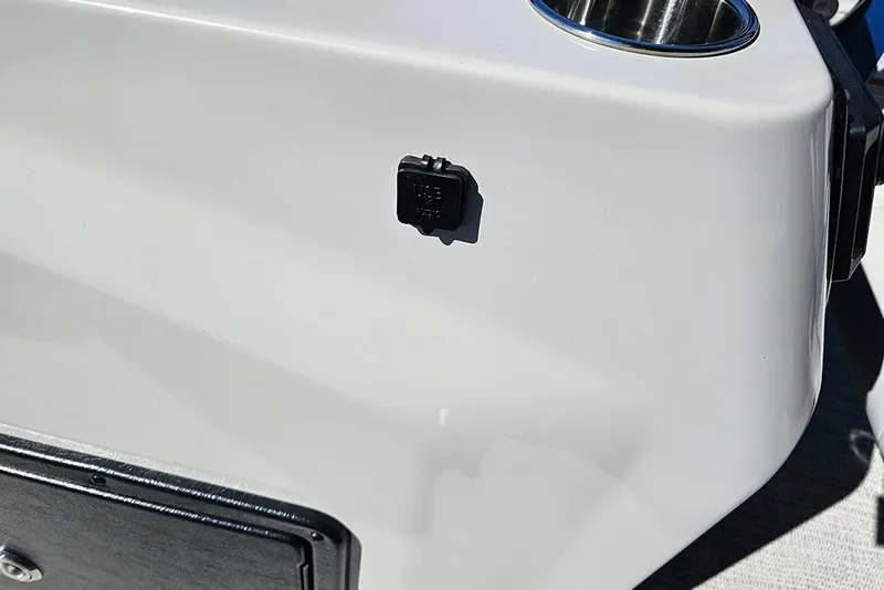 Slide: The Image of Close-up of 2026 SunCatcher Select 22C boat detail with cup holder and panel. - 20