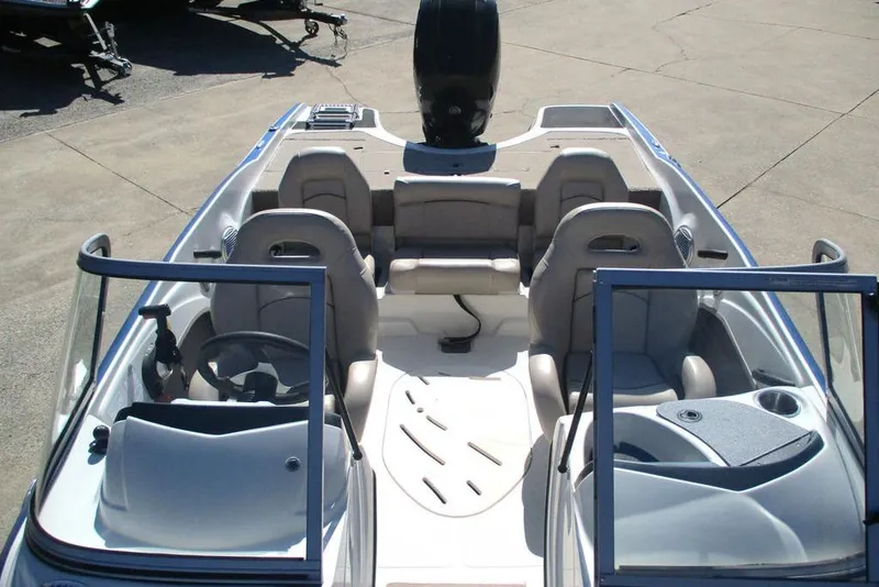 Slide: The Image of 2013 Nitro Z-7 boat interior with seating and steering wheel, viewed from above. - 10