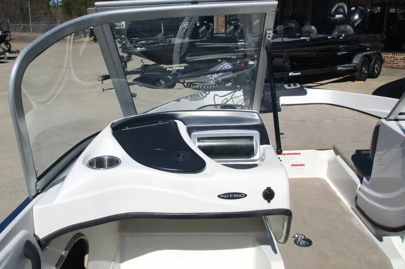 Slide: The Image of 2013 Nitro Z-7 boat interior with windshield and control panel. - 11