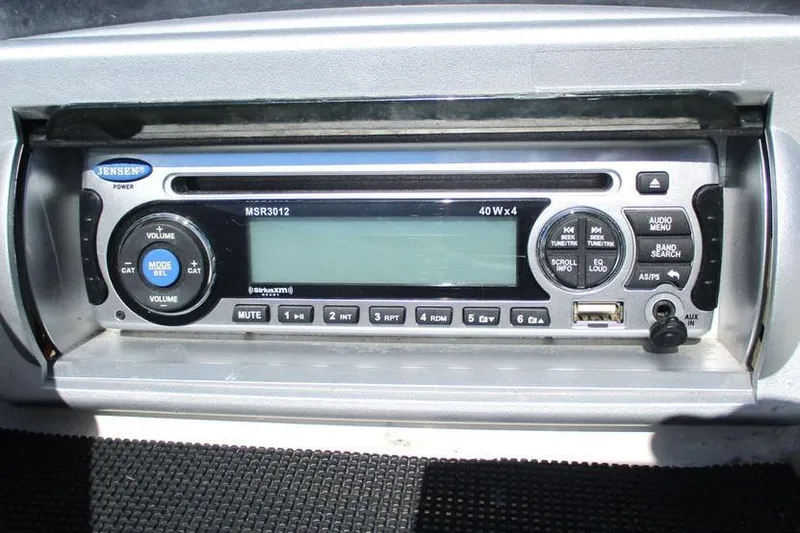 Slide: The Image of Jensen MSR3012 stereo system in a 2013 Nitro Z-7 boat dashboard. - 12