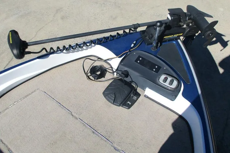 Slide: The Image of 2013 Nitro Z-7 boat deck with trolling motor and foot pedal controls. - 8