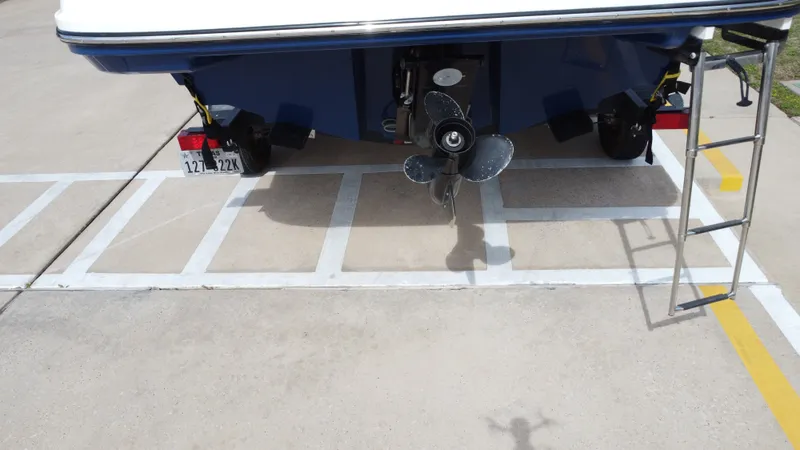 Slide: The Image of Rear view of a 2018 Bayliner VR6 with wood deck. - 18