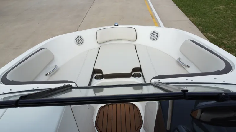 Slide: The Image of Interior of a 2018 Bayliner VR6 with wood flooring and seating. - 24