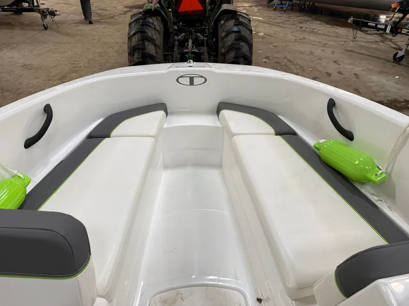 Slide: The Image of Interior of 2024 Tahoe T16 boat with gray and green accents. - 12