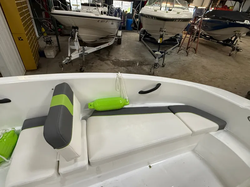 Slide: The Image of Interior of a 2024 Tahoe T16 boat in a workshop. - 20