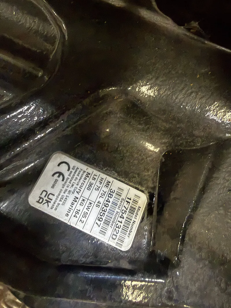 Slide: The Image of Close-up of a 2024 Tahoe T16 model label on a black surface. - 26