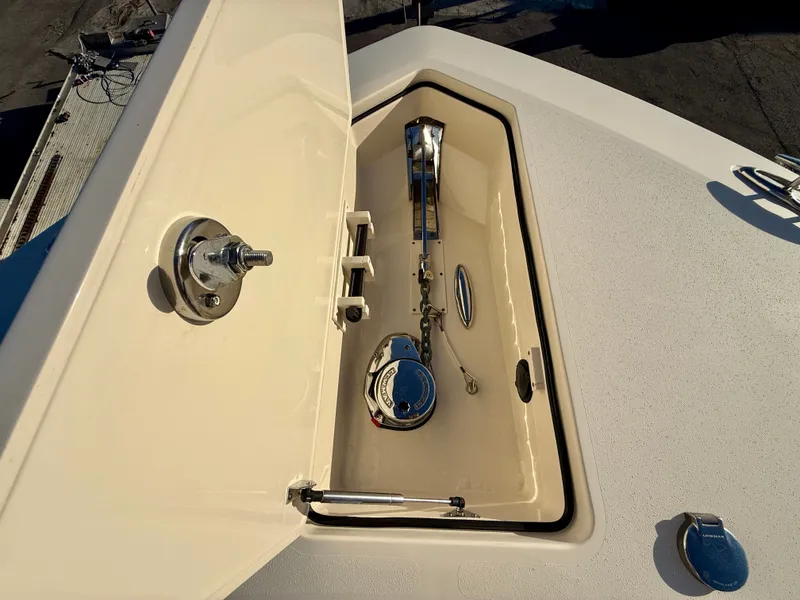 Slide: The Image of Anchor compartment of 2023 Scout 377 LXF boat. - 11