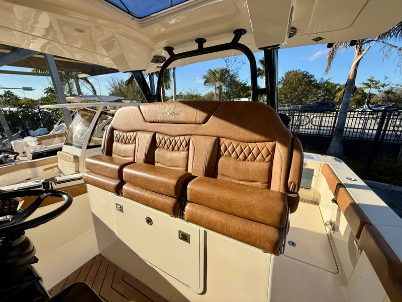 Slide: The Image of Luxurious leather seating on a 2023 Scout 377 LXF boat. - 3