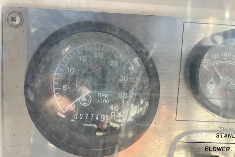 Slide: The Image of Close-up of Catalina 30 MkII 1987 tachometer showing RPM and engine hours. - 19