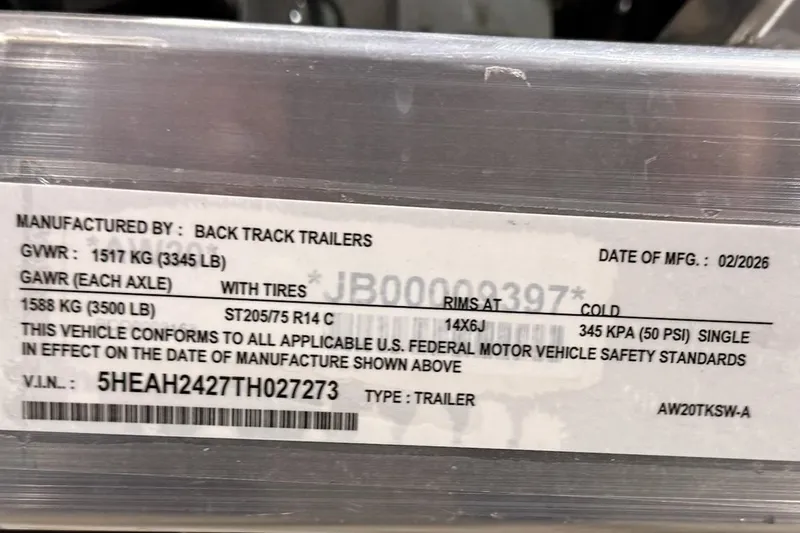 Slide: The Image of Label on Express H20 Bay 2026 trailer, detailing specifications and compliance information. - 14