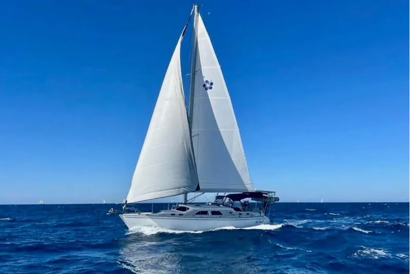 The Image of Sailing yacht Catalina Morgan 440, 2007 model, cruising on open blue sea. - 0