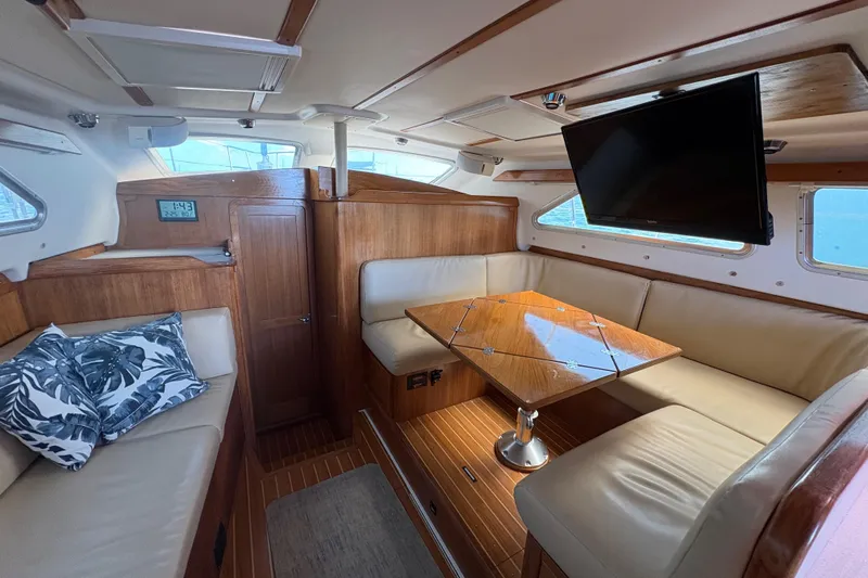 Slide: The Image of 2007 Catalina Morgan 440 sailboat docked at marina under blue sky. - 16