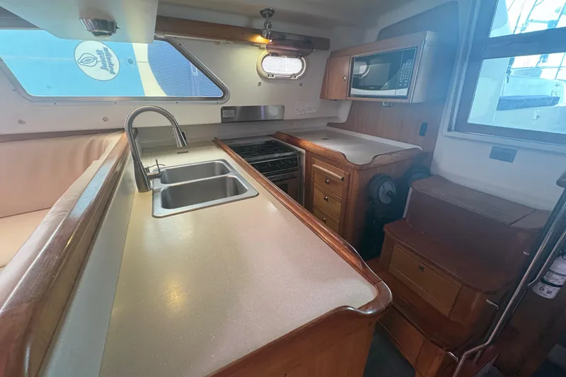 Slide: The Image of Winch and ropes on a 2007 Catalina Morgan 440 sailboat deck. - 19