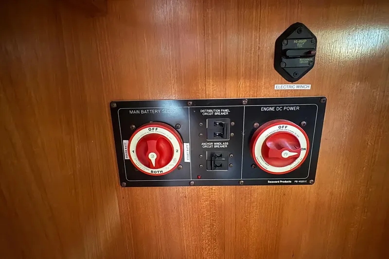 Slide: The Image of Cockpit of 2007 Catalina Morgan 440 sailboat with steering wheel and navigation instruments. - 27