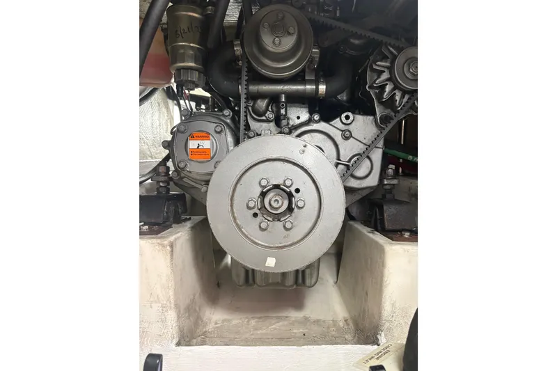 Slide: The Image of Cockpit of 2007 Catalina Morgan 440 sailboat with navigation instruments and steering wheel. - 30