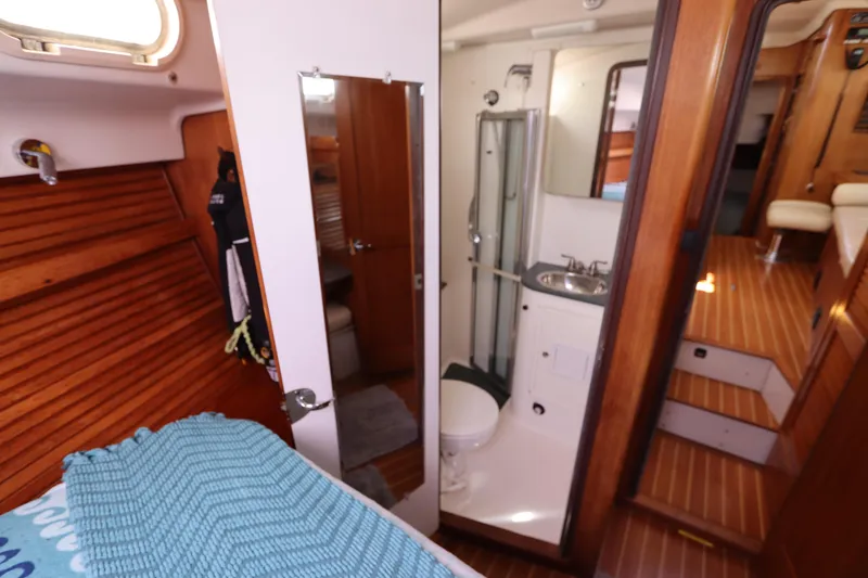 Slide: The Image of Interior of 2007 Catalina Morgan 440 yacht with bathroom and wooden finishes. - 47