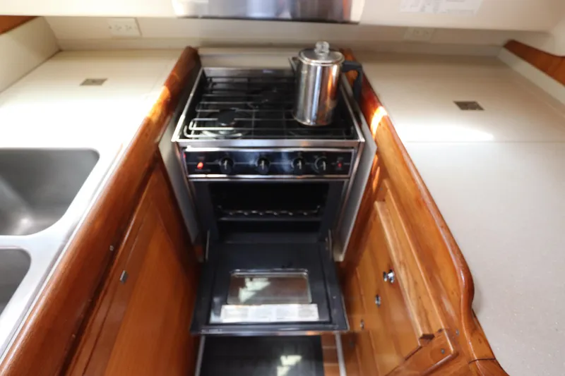 Slide: The Image of Galley kitchen in 2007 Catalina Morgan 440 yacht with stove and sink. - 57