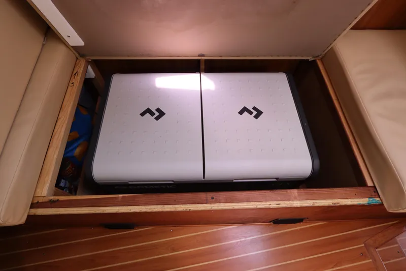 Slide: The Image of Storage compartment in 2007 Catalina Morgan 440 yacht with Dometic cooler. - 59