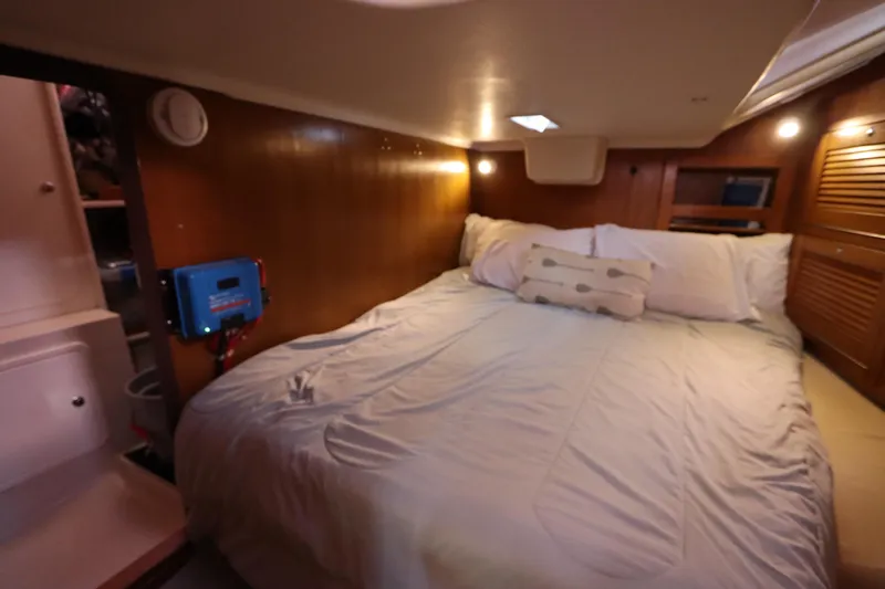 Slide: The Image of Cozy cabin interior of 2007 Catalina Morgan 440 yacht with comfortable bedding. - 66