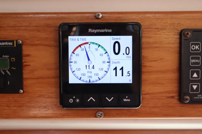 Slide: The Image of Raymarine display on 2007 Catalina Morgan 440, showing speed and depth readings. - 69