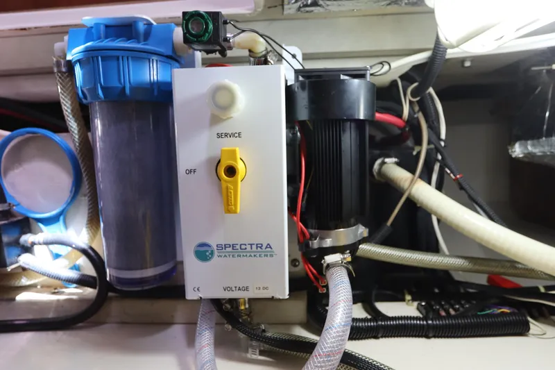 Slide: The Image of Spectra watermaker system in a 2007 Catalina Morgan 440 yacht engine room. - 78