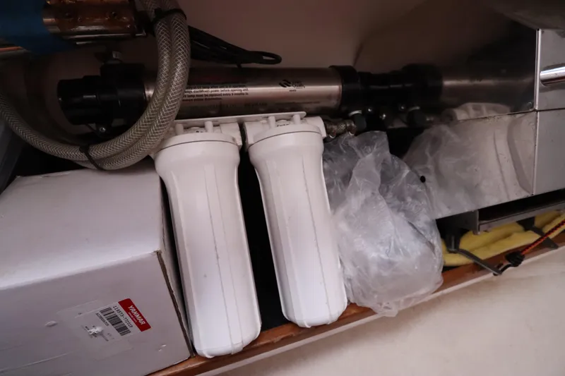 Slide: The Image of Water filtration system in a 2007 Catalina Morgan 440 yacht engine compartment. - 81