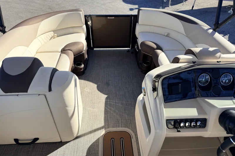 Slide: The Image of Luxurious interior of 2026 Avalon 2385 LSZ Quad Lounger Tri Toon boat, featuring plush seating. - 11