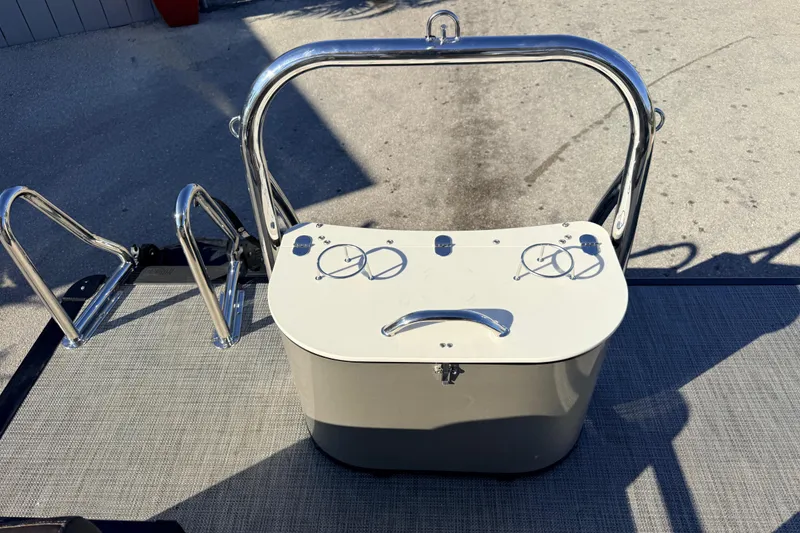 Slide: The Image of 2026 Avalon 2385 LSZ Quad Lounger, Tri Toon, High Performance boat with sleek metal features. - 23