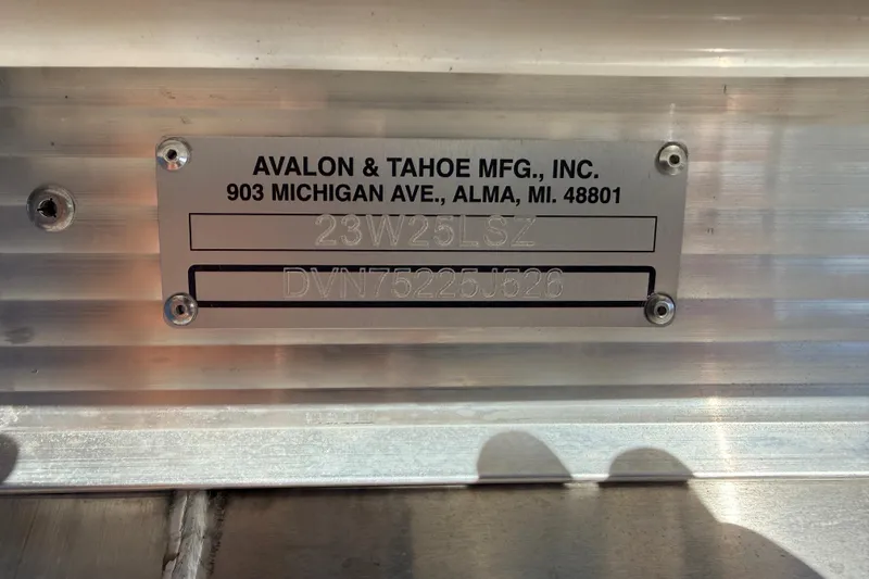 Slide: The Image of Metal identification plate for Avalon 2385 LSZ Quad Lounger, Tri Toon, 2026 model. - 26
