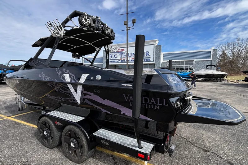 Slide: The Image of 2012 Axis A22 Vandall Edition boat on trailer at dealership parking lot. - 36