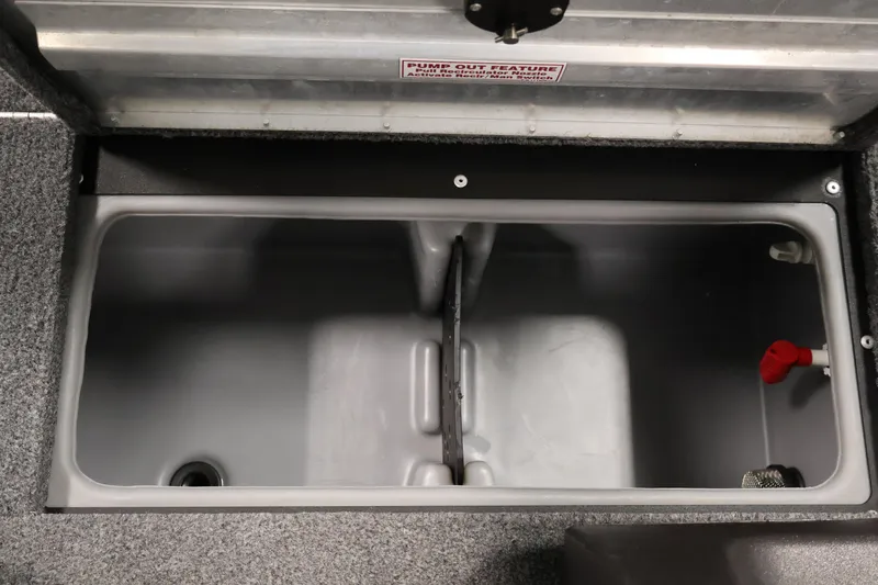 Slide: The Image of 2024 Tracker Pro Guide V-16 WT livewell interior with pump-out feature. - 18