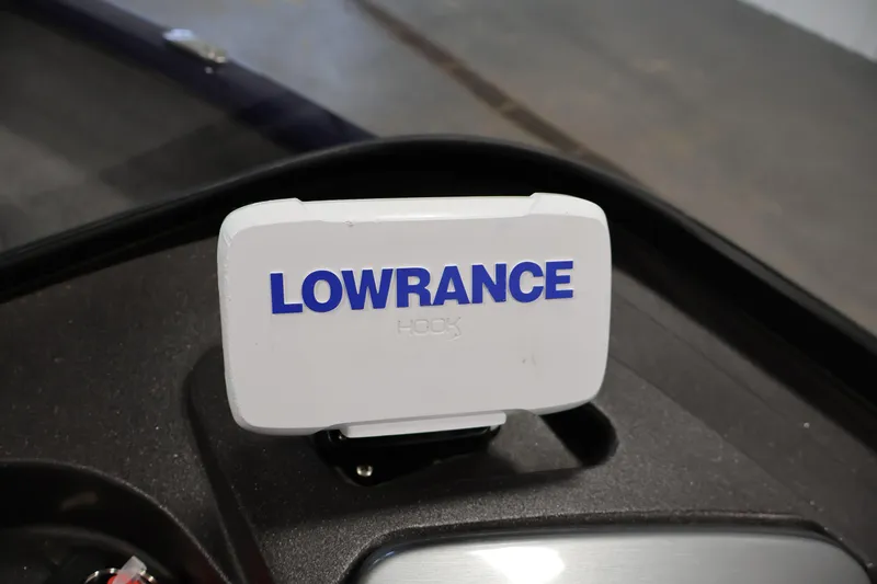 Slide: The Image of Lowrance device on 2024 Tracker Pro Guide V-16 WT boat dashboard. - 23