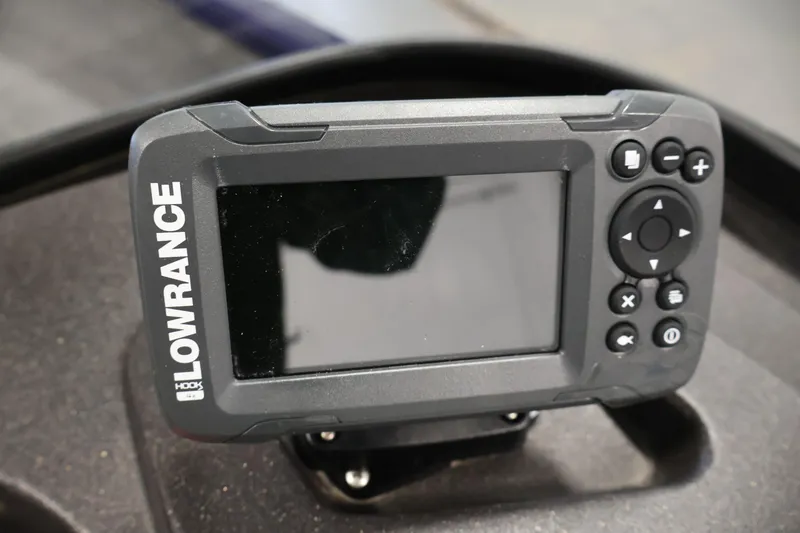 Slide: The Image of Lowrance fish finder on 2024 Tracker Pro Guide V-16 WT boat dashboard. - 24