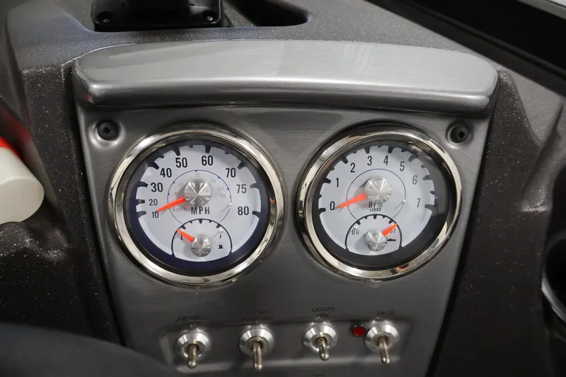 Slide: The Image of Dashboard of 2024 Tracker Pro Guide V-16 WT with speedometer and tachometer. - 25