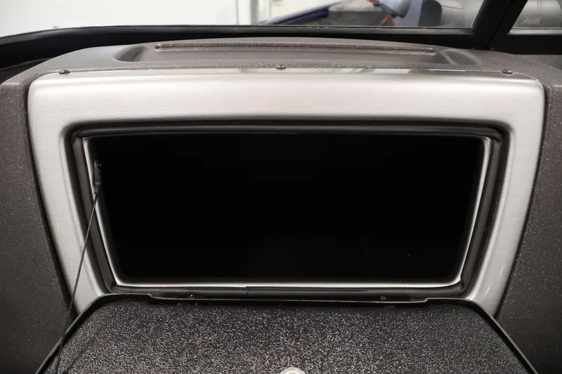 Slide: The Image of 2024 Tracker Pro Guide V-16 WT dashboard with sleek, modern design and black display. - 30