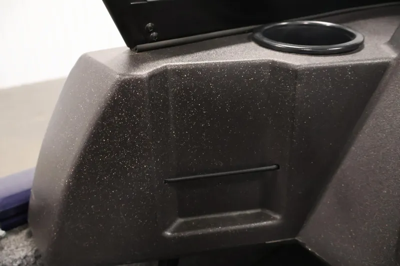 Slide: The Image of 2024 Tracker Pro Guide V-16 WT interior detail with cup holder. - 31