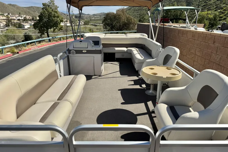 Slide: The Image of 1999 Godfrey Parti Kraft 240 ES pontoon boat with spacious seating and canopy. - 10