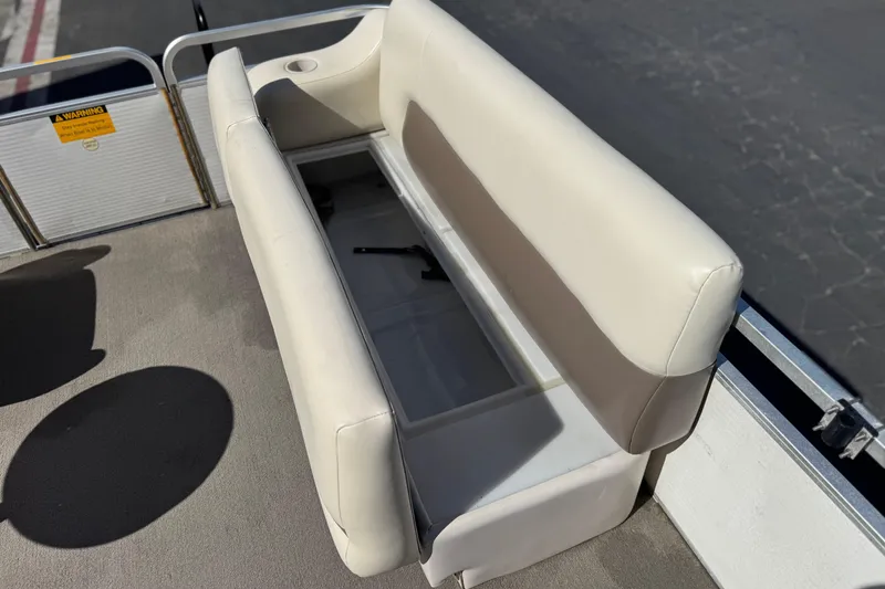 Slide: The Image of 1999 Godfrey Parti Kraft 240 ES pontoon boat seat with storage compartment. - 14