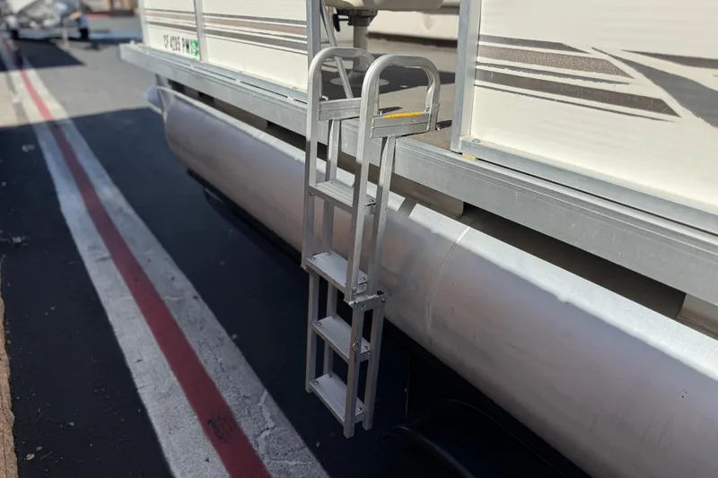 Slide: The Image of Aluminum ladder attached to 1999 Godfrey Parti Kraft 240 ES pontoon boat. - 16