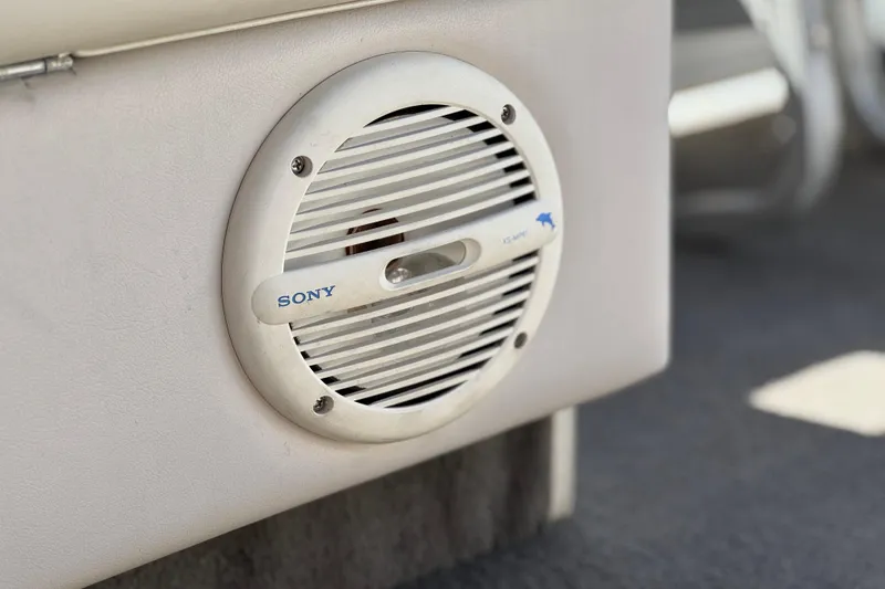Slide: The Image of Sony speaker on 1999 Godfrey Parti Kraft 240 ES boat interior. - 18