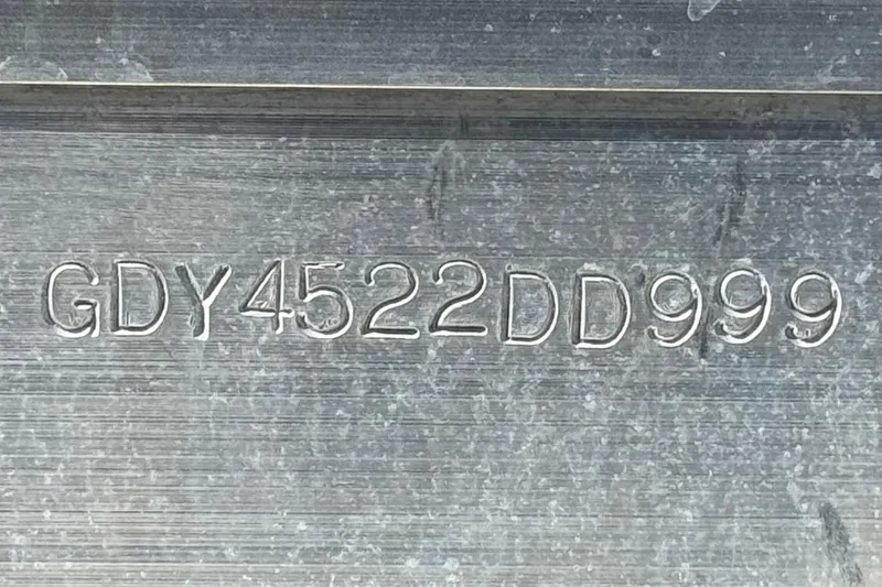 Slide: The Image of Hull identification number on 1999 Godfrey Parti Kraft 240 ES boat. - 25