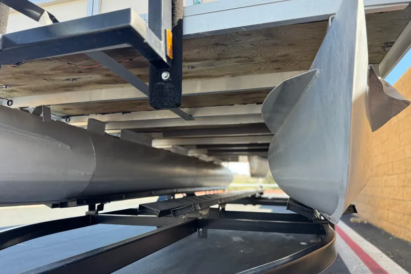 Slide: The Image of Underneath view of a 1999 Godfrey Parti Kraft 240 ES pontoon boat on a trailer. - 4