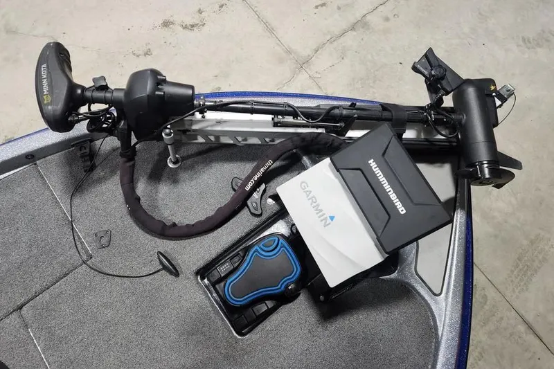 Slide: The Image of 2019 Falcon F195 boat with Garmin and Humminbird electronics on deck. - 16