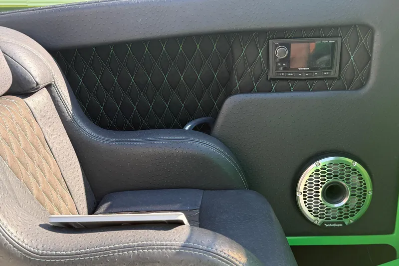 Slide: The Image of Luxurious interior of 2021 E-Ticket 29 with premium audio system and quilted leather seats. - 22