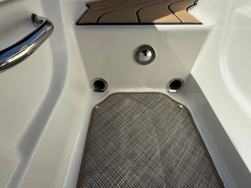 Slide: The Image of Close-up of a boat deck with non-slip flooring and stainless steel fittings. - 29