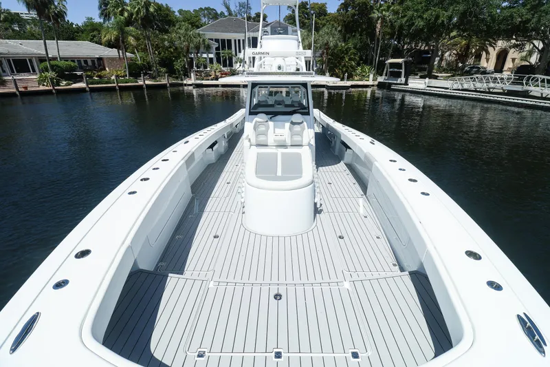 Slide: The Image of Cockpit of 2022 Freeman 47 boat with navigation screens and steering wheel. - 20